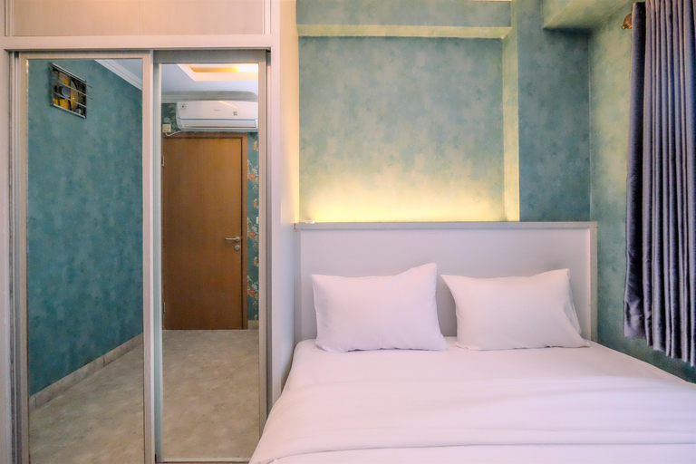 Bedroom 2, Warm and Comfortable Designed 2BR at Podomoro Golf View Apartment By Travelio, Bogor