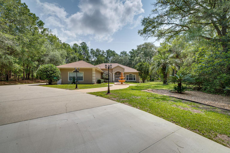 Exterior & Views 1, 4 Mi to Rainbow Springs: Dunnellon Villa w/ Pool!, Marion