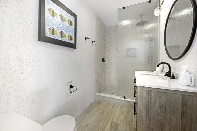 Bathroom 3, Dancing Dolphin 4 Bedroom Home by RedAwning, Lee