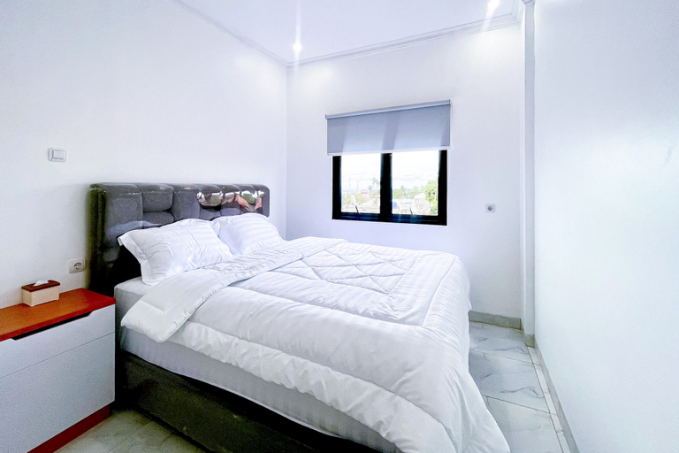 Urbanview Hotel Amira Syariah Bogor Room Type - Deluxe Room