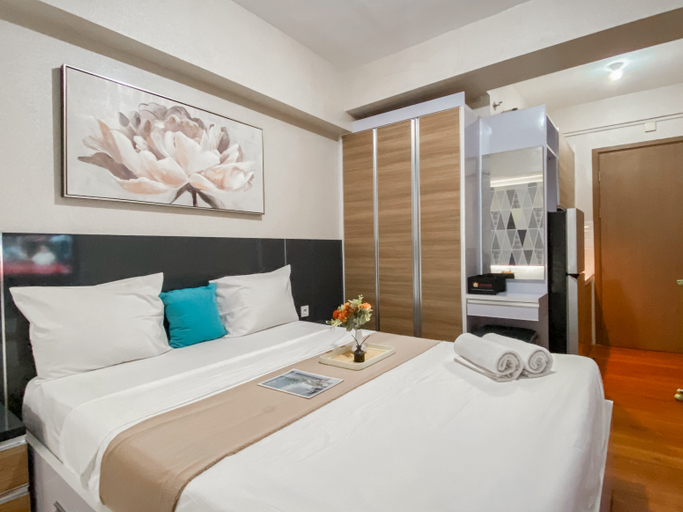 Bedroom 2, Warm and Homey Studio at Podomoro Golf View Apartment By Travelio, Bogor