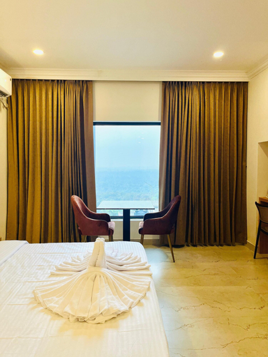 Bedroom 3, Richmond Inn and Suites, Udupi
