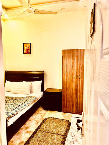 Bedroom 2, Swiss Cottage Luxury Living, Islamabad