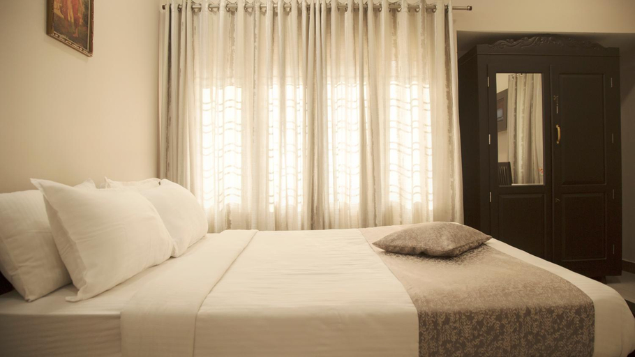 Bedroom 2, Nambiars Premium Heritage Hotel, Ernakulam
