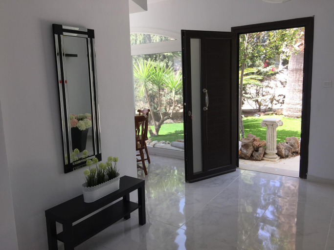 Public Area, Villa Neyla Four bedroom Coral Bay Beach front