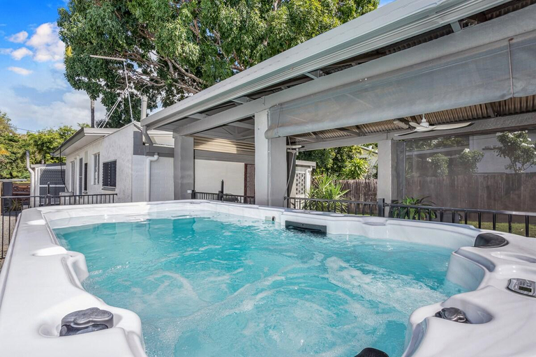 Others 5, Seaside Serenity: Modern 2BR Escape with Spa, Cairns