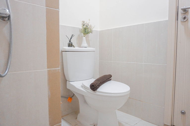 Bedroom 3, Spacious and Comfy 2BR with Extra Room Apartment at Meikarta By Travelio, Cikarang
