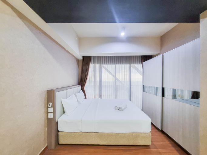 Bedroom 1, Cozy and Warm Studio Room at Uttara The Icon Apartment By Travelio, Sleman