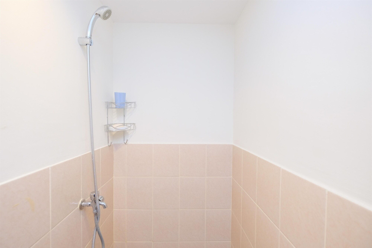 Bathroom 3, Simply Cozy 2BR Apartment at Podomoro Golf View, Bogor