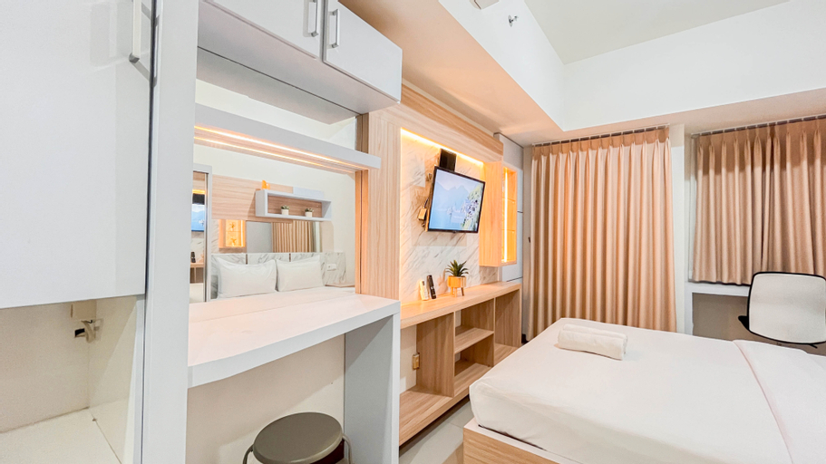 Bedroom 1, Cozy and Compact Studio Apartment at Vida View Makassar By Travelio, Makassar
