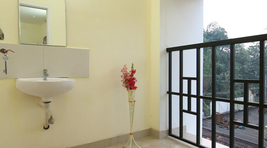 Others 5, Thanungattil Towers, Kottayam