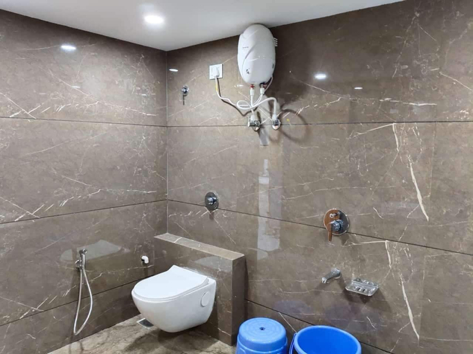 Bathroom 3, Hotel just inn, Ahmadabad