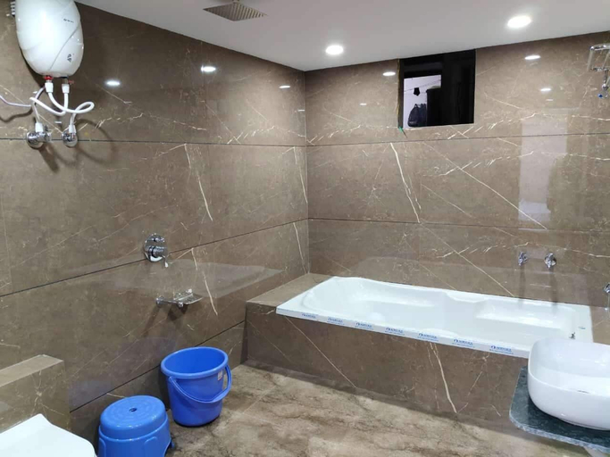 Bathroom 5, Hotel just inn, Ahmadabad