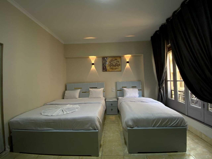 Bedroom 5, Sky light hotel, 'Abdin