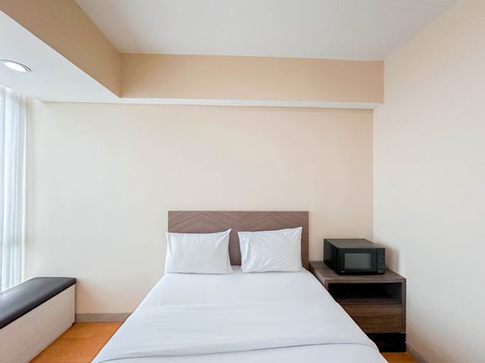Best Price and Relaxing Studio (No Kitchen) at Tamansari Papilio Apartment By Travelio, Surabaya