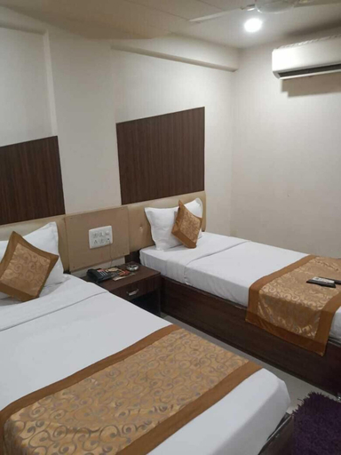 Bedroom 5, Hotel Asian Inn, Nagpur