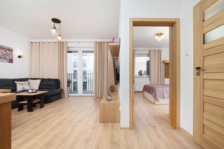 Modern Apartment with Parking & Near Manufaktura in Lodz by Noclegi Renters, Łódź