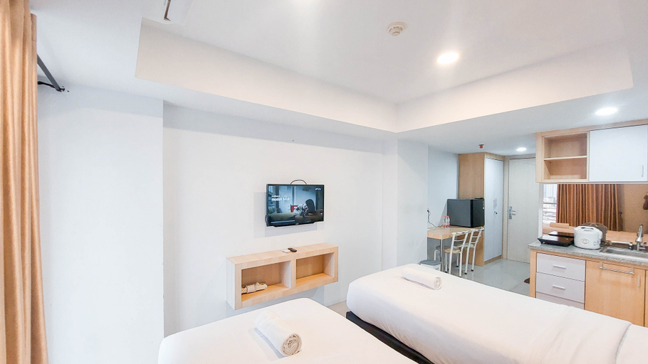Bedroom 2, Best Deal Studio Apartment at De Prima By Travelio, Medan