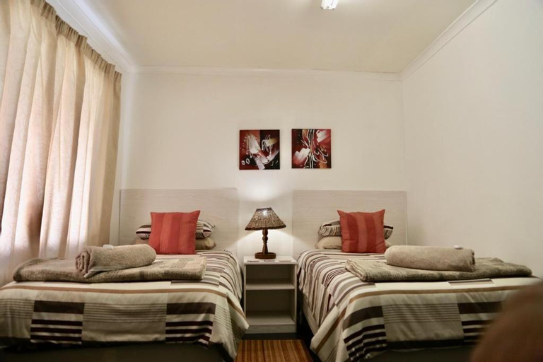 Mechell's Accomodation, Chris Hani