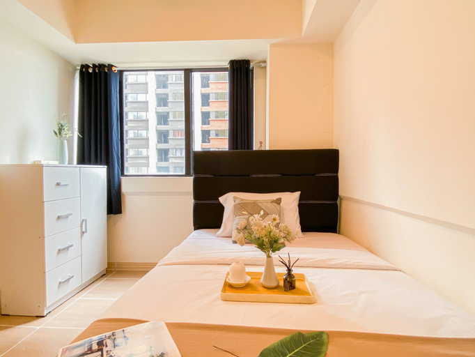 Bedroom 1, Cozy and Best Choice 2BR Apartment at Meikarta By Travelio, Cikarang