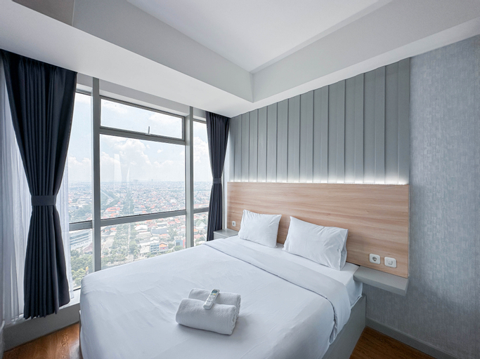 Bedroom 1, Elegant and Compact 1BR at Grand Sungkono Lagoon Apartment By Travelio, Surabaya