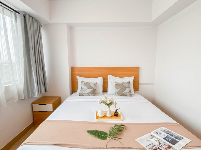 Bedroom 1, Comfort and Simply Look 2BR at Meikarta Apartment By Travelio, Cikarang