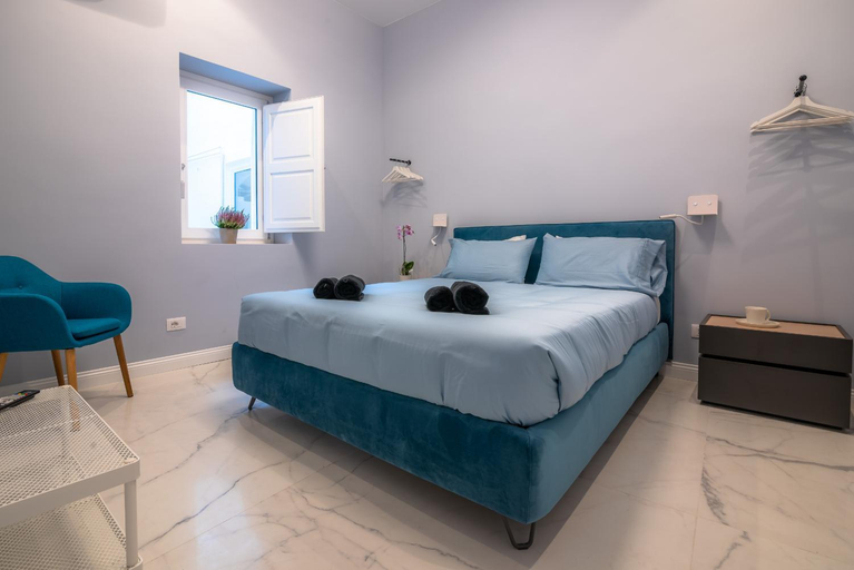 Bedroom 1, Frida apartments by Dimore in Sicily, Syracuse