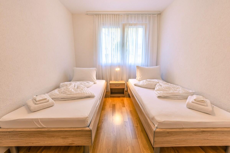 Bedroom 2, Apartment Harder - Aare Jungfrau AG, Interlaken