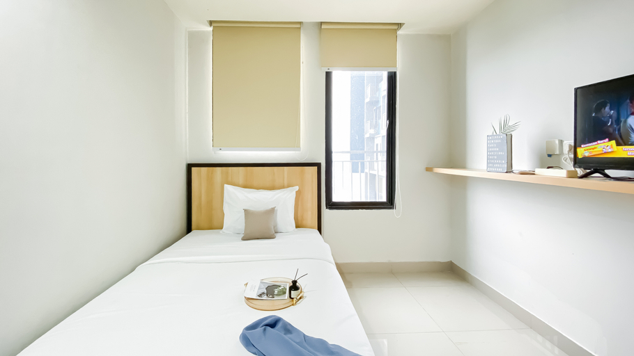 Bedroom 2, Nice and Comfy Studio at Evenciio Margonda Apartment By Travelio, Depok