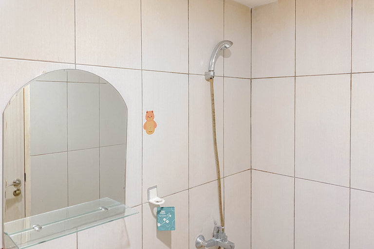 Bathroom 5, Nice and Elegant  2BR at Grand Kamala Lagoon Apartment By Travelio, Bekasi