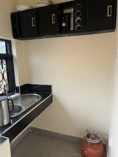 Private kitchen, Beautiful 1-Bed Apartment in Gulu, Gulu