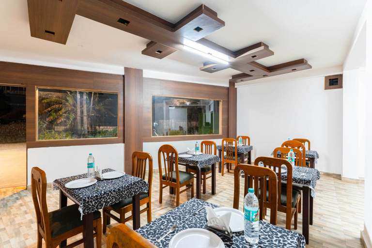 Food & Drinks 5, Treebo Regalia Comforts, 5 mins to Raja Seat Garden, Kodagu