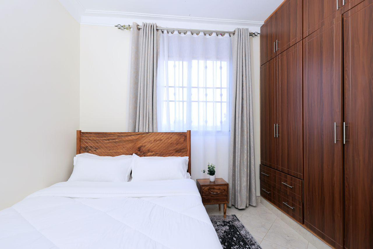Bedroom 2, Comfortable and Sophisticated apartment , Kampala