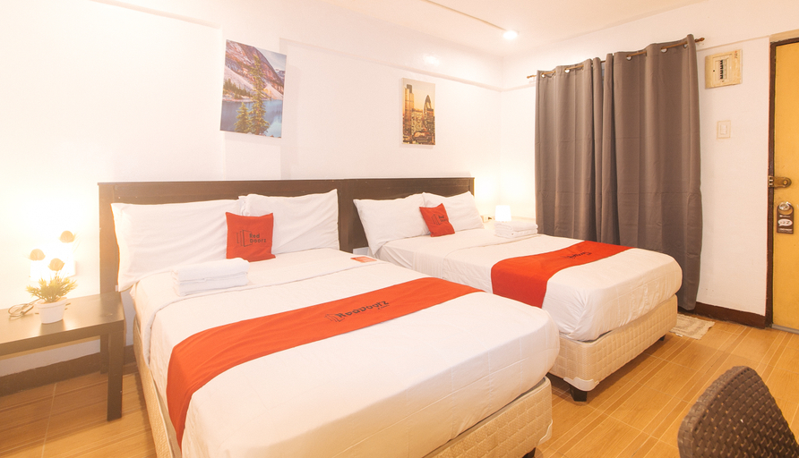 RedDoorz @ City Stay Inns Marilao - Tap to explore photos