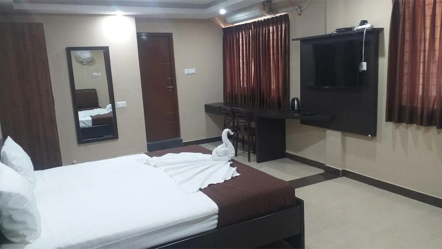 Bedroom 2, The Nisarga Grand Boarding & Lodging, Bangalore