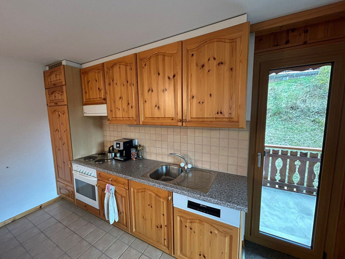 Private kitchen, Gracious Apartment With Patio in Hills, Conthey
