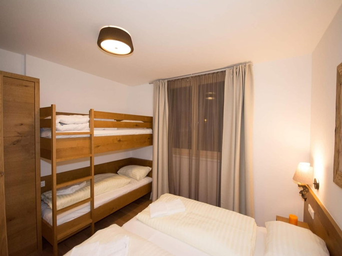 Bedroom 2, Apartment in Neukirchen near Ski Lift, Zell am See