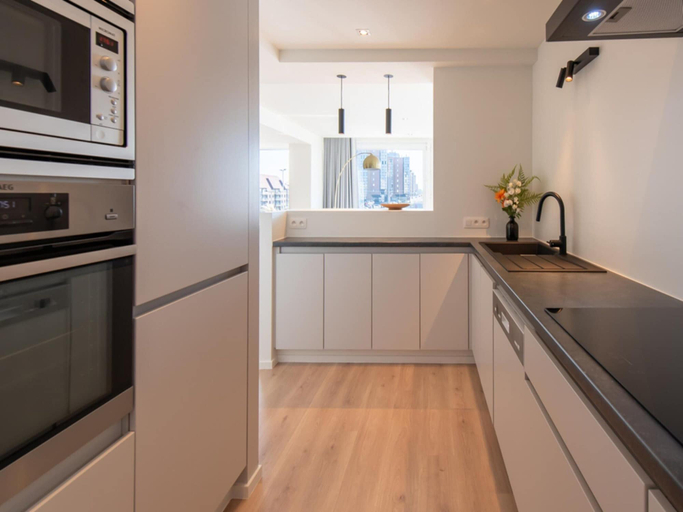 Private kitchen 5, Renovated Apartment With sea View in Mariakerke, West-Vlaanderen
