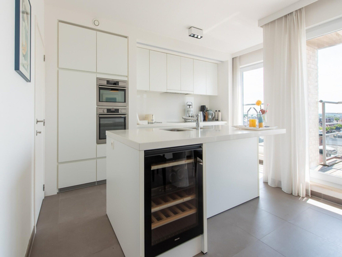 Private kitchen 3, Duplex Apartment With 4 Terraces and sea View, West-Vlaanderen