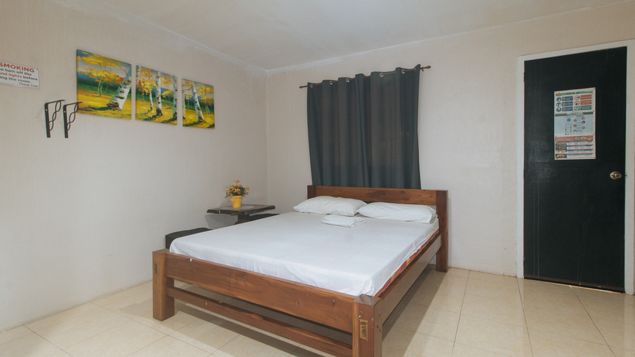 Bedroom 4, Riannes Beach Resort by RedDoorz, Leganes