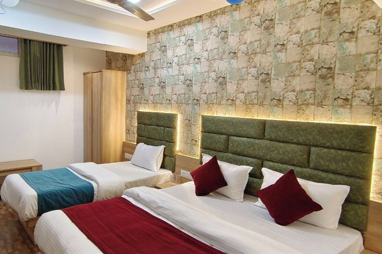 Bedroom 2, Hotel Matrix Inn, Ahmadabad