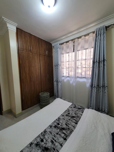 Bedroom 2, Modern and Homely Apartment, Kampala