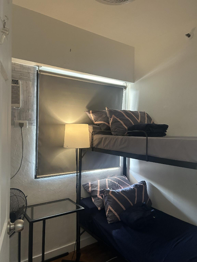 Bedroom 2, Breezy, rustic 3 Bedroom Condo on the 22nd floor, Taguig
