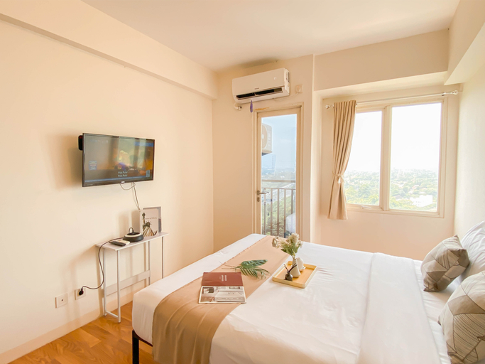 Bedroom 2, Cozy and Tranquil Studio at Podomoro Golf View Apartment By Travelio, Bogor