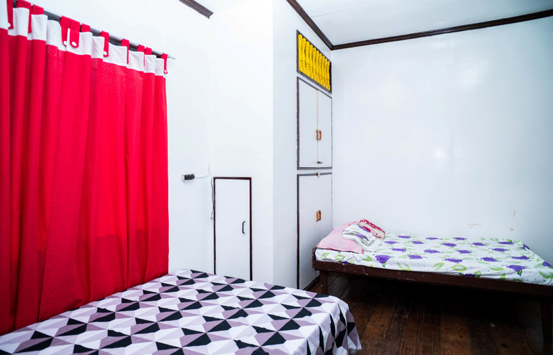Bedroom 4, Mangrove Breeze Country Inn by RedDoorz, Del Carmen