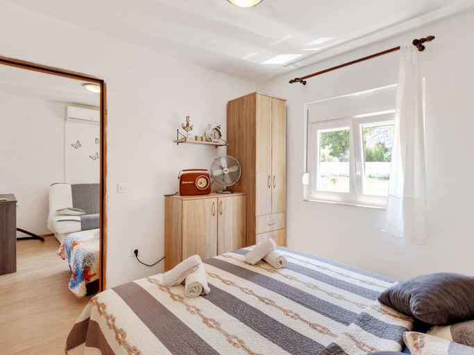 Bedroom 4, Simplistic Holiday Home in Jasenice Rovanjska near Sea, Jasenice