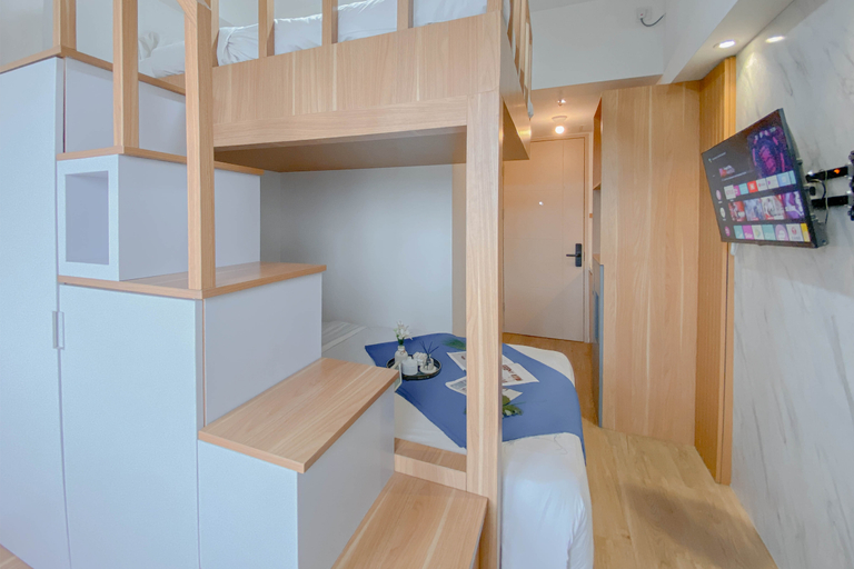 Bedroom 2, Simply Look and Restful Studio at Tokyo Riverside PIK 2 Apartment By Travelio, Tangerang