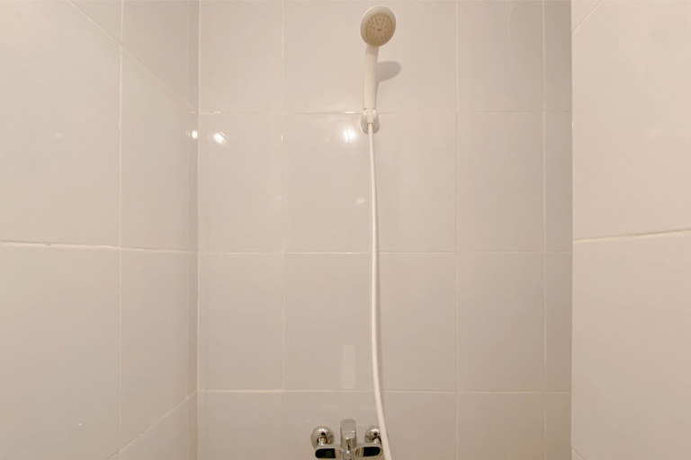 Bathroom 5, Simply Look and Restful Studio at Tokyo Riverside PIK 2 Apartment By Travelio, Tangerang