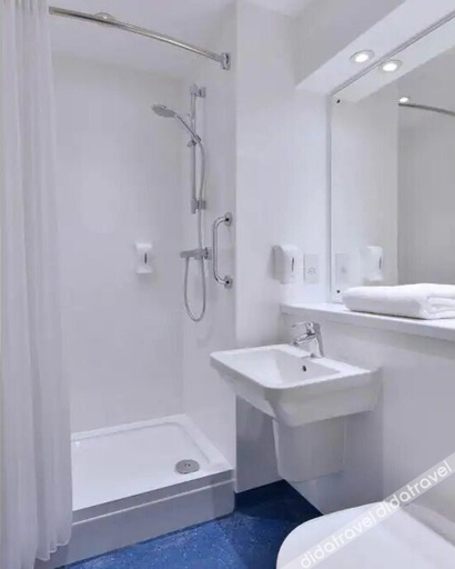 Bathroom 4, Travelodge Cambridge Orchard Park, Cambridgeshire