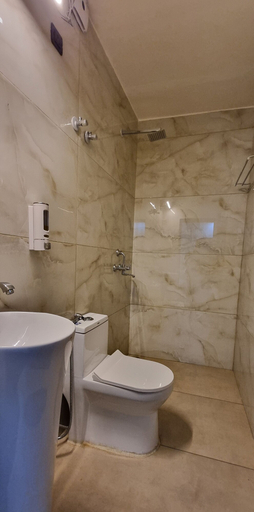 Bathroom 4, Ambika Hotels, Faridabad